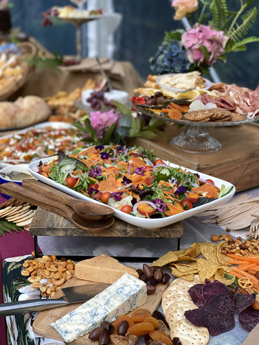 Grazing tables are such a visual experience for your guests.  Adding some Salads and hot chickens makes them perfect for an evening event. 